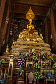 Bangkok Wat Pho, altar of the ubosot with statues of Buddha and disciples.  